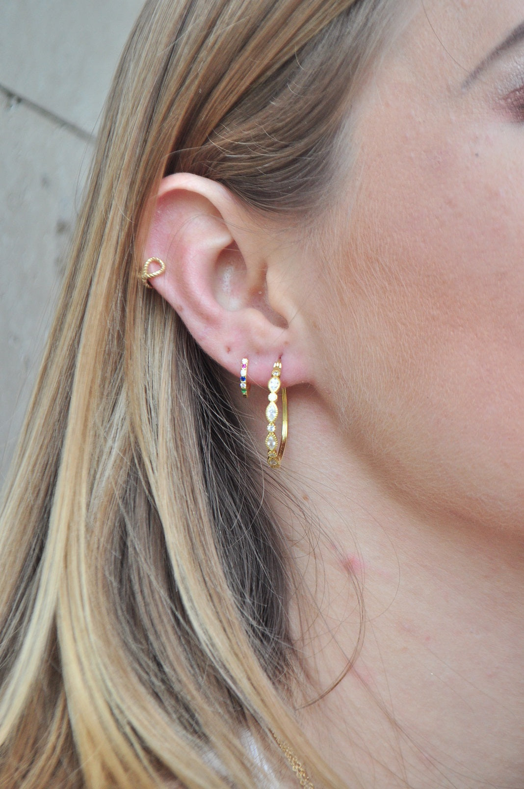 Gold mini rainbow hoops