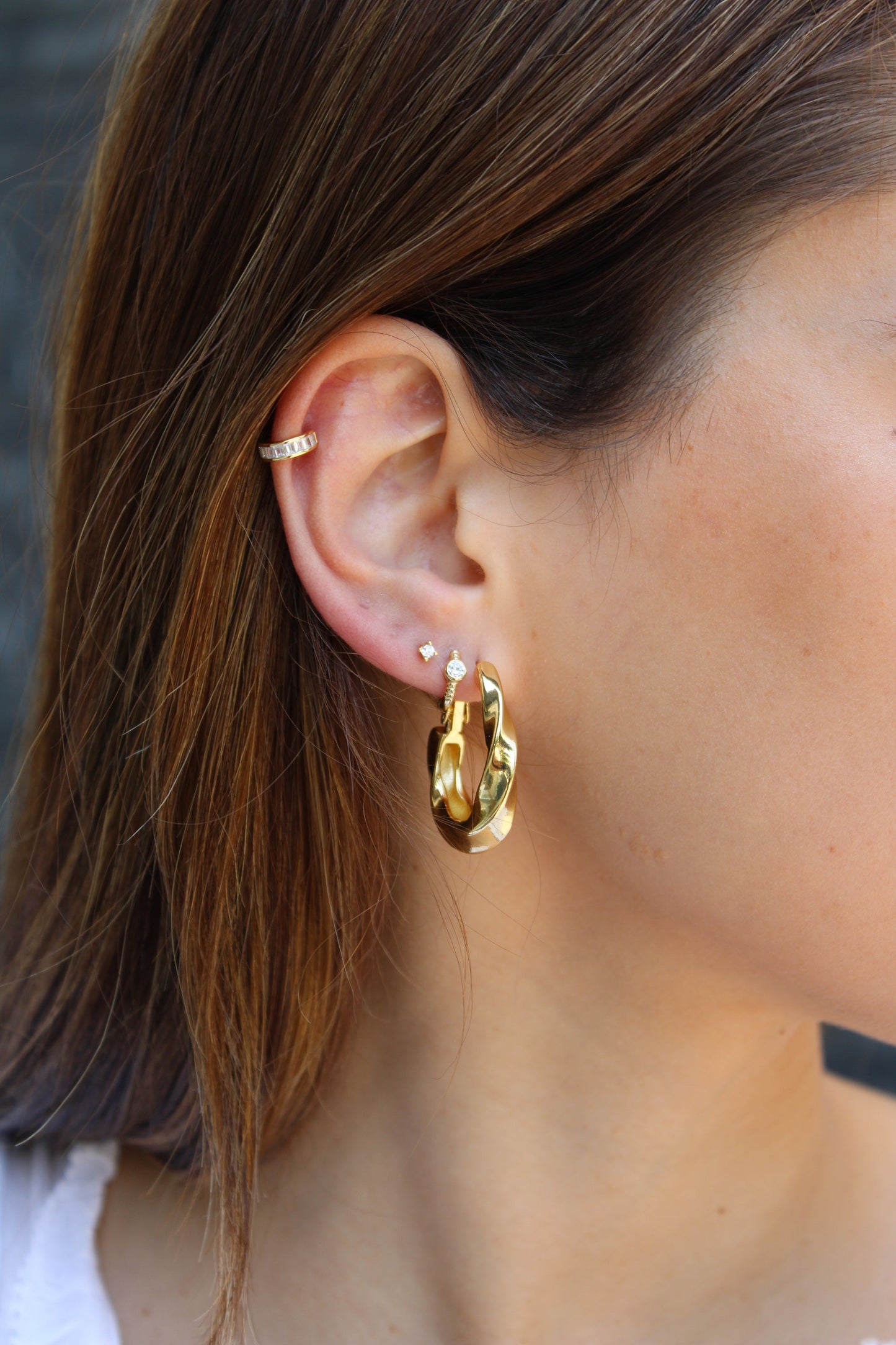 Twist gold hoops