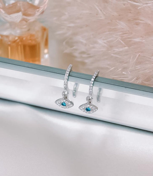 Evil eye silver hoops